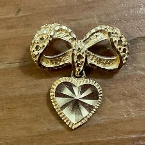 Beverly Hills: 14k. Gold vintage Dangle Heart and Bow Pendant